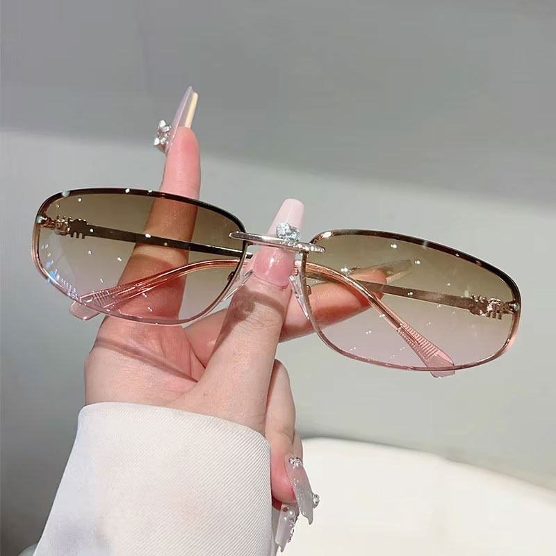 Lunettes de soleil ovales sans monture pour femme, style rétro tendance, idéales pour les voyages et les photos de rue, lunettes de soleil tendance pour homme.