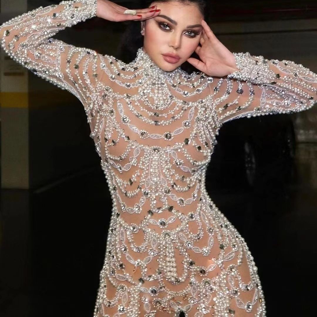 La nouvelle robe pour femmes européennes et américaines 2025 est amincissante et ajustée, avec des paillettes transparentes et un pantalon une pièce sexy
