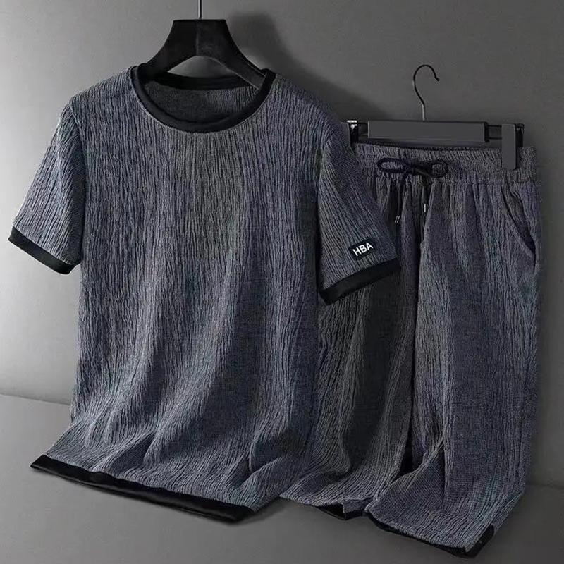 Nouveaux ensembles d'été pour hommes, vêtements de sport décontractés en soie glacée légère, respirants, t-shirt à manches courtes, shorts, ensemble de sport tendance, M-4XL