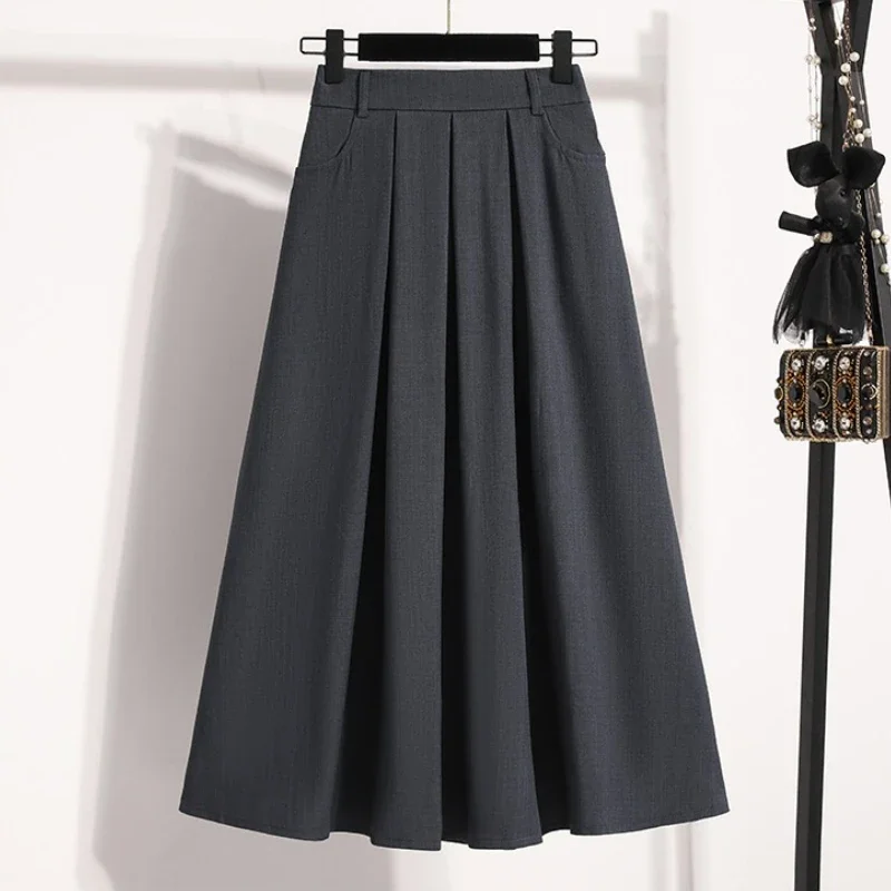 Robe Maxi trapèze plissée, couleur unie, jupe polyvalente mi-longue, couverture des hanches, nouveau Style printemps été 2026, jupe mi-longue