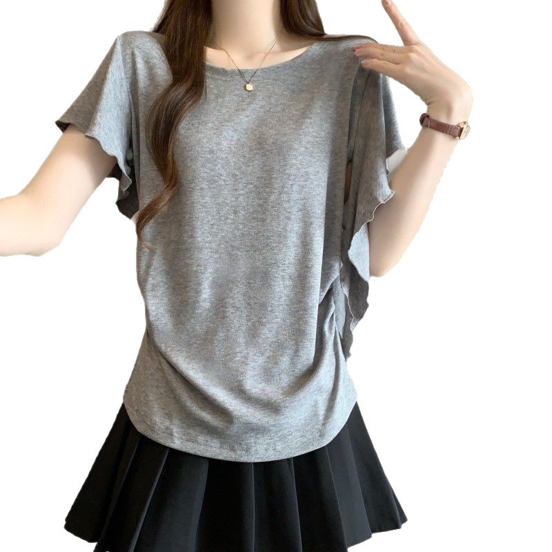 T-shirt d'été pour femmes grandes tailles, nouveau style uni, coupe ample, amincissant, dissimulant les imperfections, à volants irréguliers et manches courtes