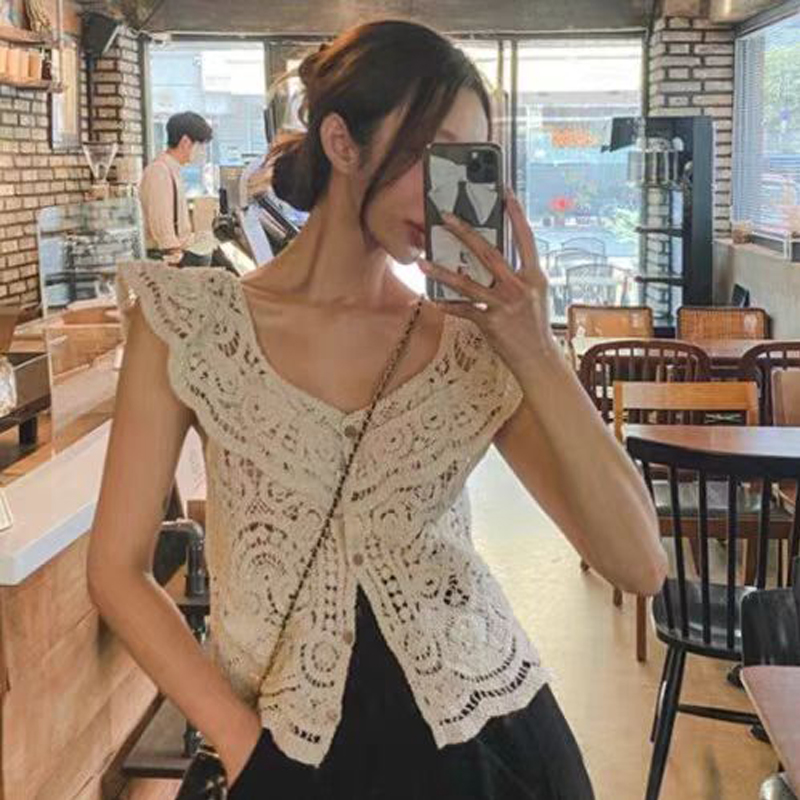 Mode coréenne sans manches tricoté hauts simple boutonnage décontracté femmes Blouse été crochet fleur chemise creuse