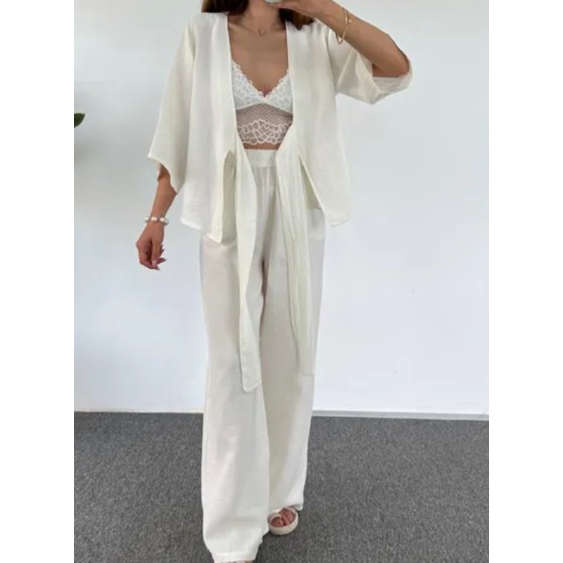 Nouvelle tenue élégante pour femme : costume à col en V qui affine la taille et met en valeur les courbes