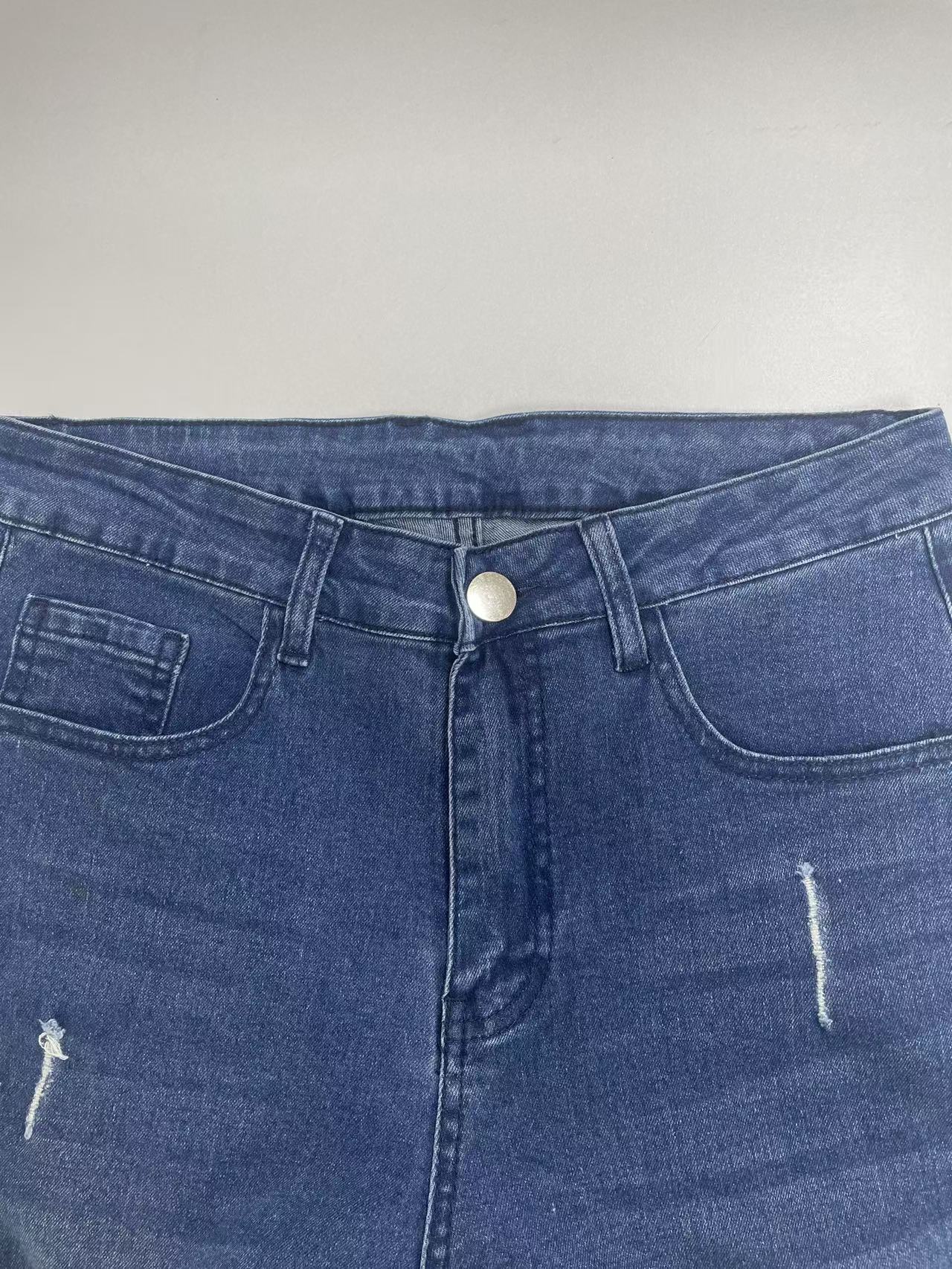 Jeans en denim stretch slim pour homme avec détails déchirés et surpiqûres contrastées, pantalon décontracté streetwear tendance pour le quotidien