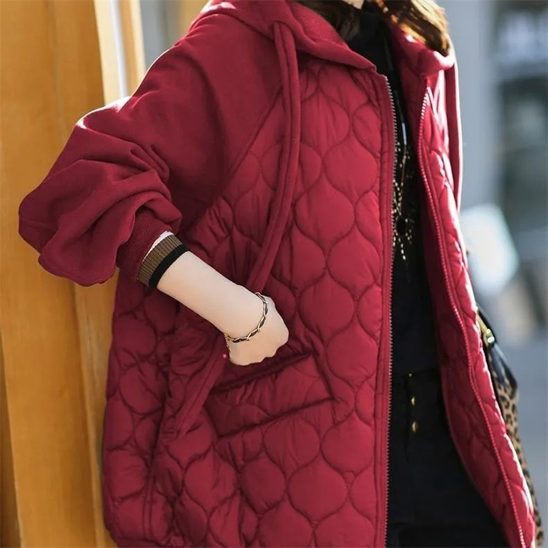 Veste d'automne/hiver pour femme, à capuche, en coton matelassé, modèle 2026, style européen, grande taille, coupe ample, vêtement d'extérieur pour femme.