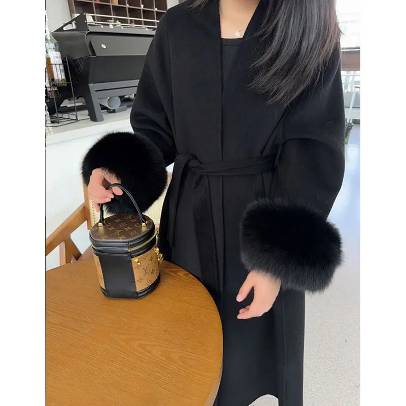 Femmes automne hiver manteau de laine 2025 nouveau haut de gamme Style français manches de fourrure mi-long manteau de laine femmes manteau Long vêtements d'extérieur amples