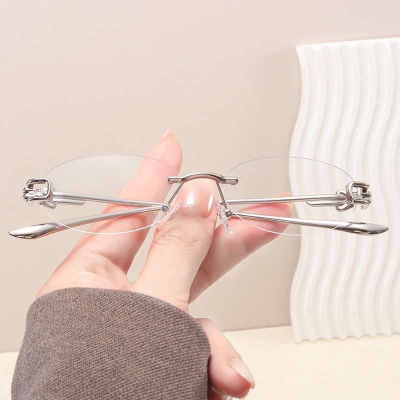 Lunettes de soleil ovales élégantes pour femmes, sans monture, décontractées, avec monture métallique, verres anti-lumière bleue, protection UV400, style urbain avancé