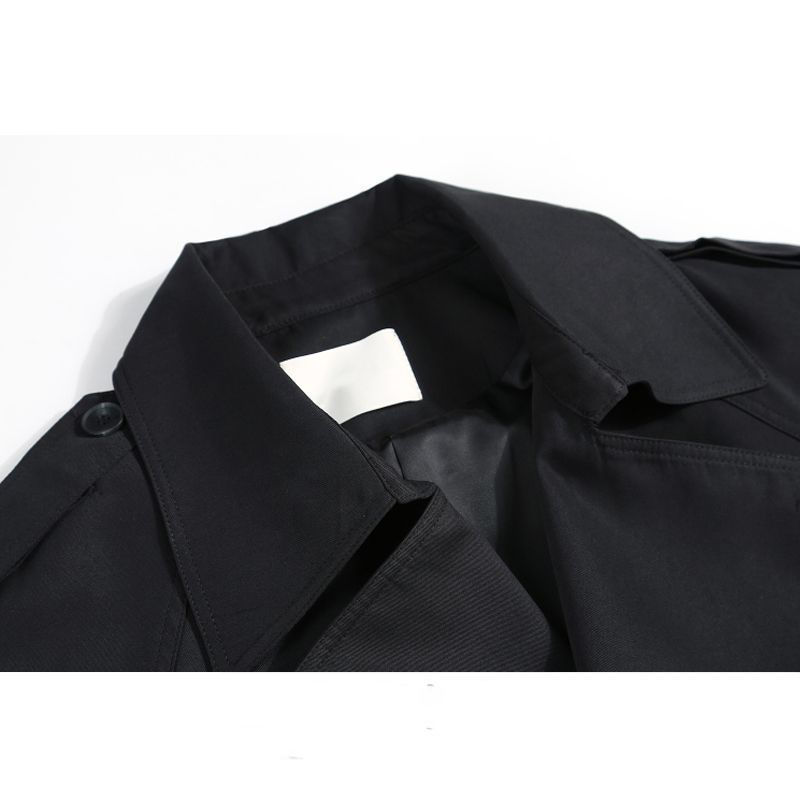 Manteaux coupe-vent mi-longs pour femmes à la mode et polyvalents pour le printemps et l'automne, avec un design coupe ample. Manteau long