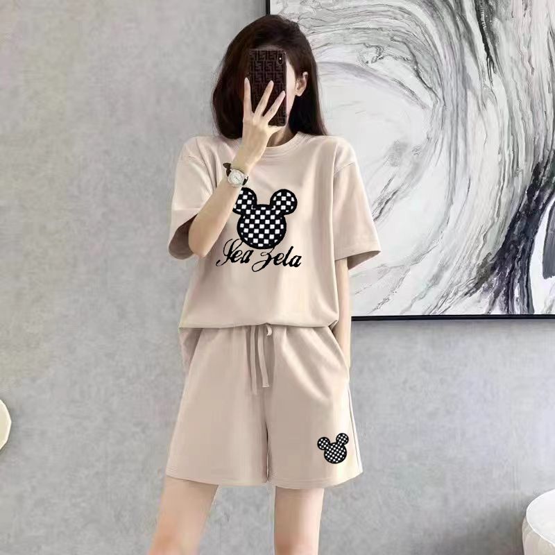 Mode apparaître mince été costume décontracté femmes simplicité bureau dame dessin animé couleur unie coréen à manches courtes Shorts deux pièces ensemble