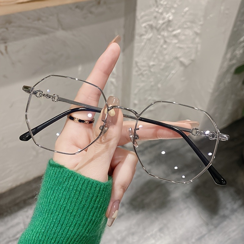Lunettes rondes tendance avec montures métalliques simples et élégantes, verres en PC durables, confortables à porter, adaptées à un usage quotidien