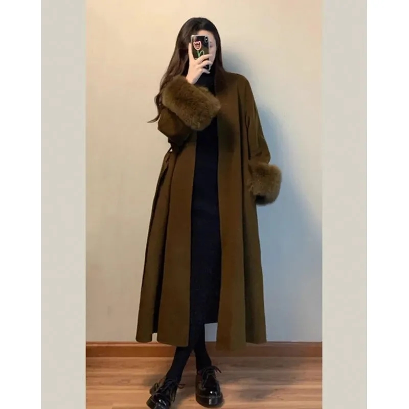 Femmes automne hiver manteau de laine 2025 nouveau haut de gamme Style français manches de fourrure mi-long manteau de laine femmes manteau Long vêtements d'extérieur amples
