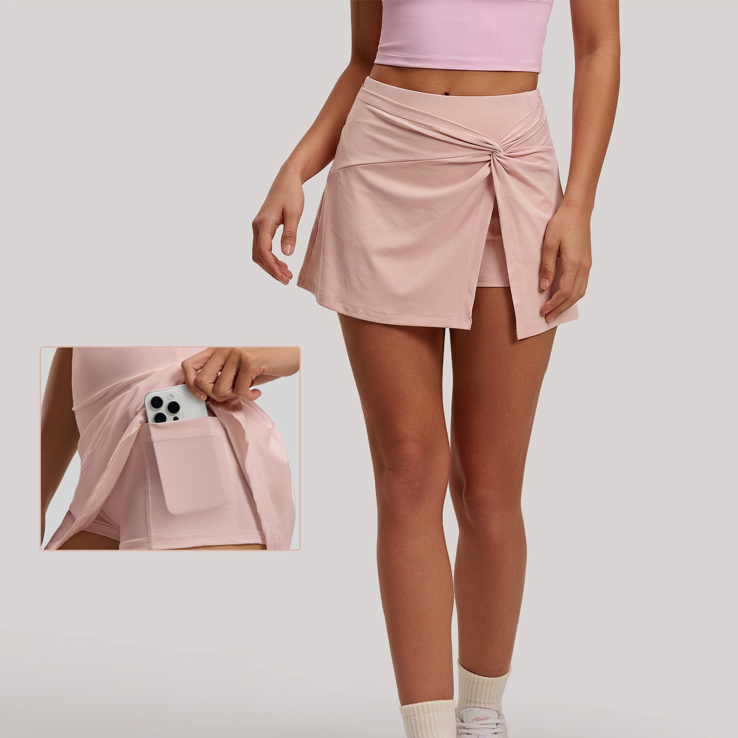 Jupe de sport pour femme, jupe de tennis taille haute avec nœud avant, fente discrète, jupe plissée respirante, mini-jupe avec poches, rose