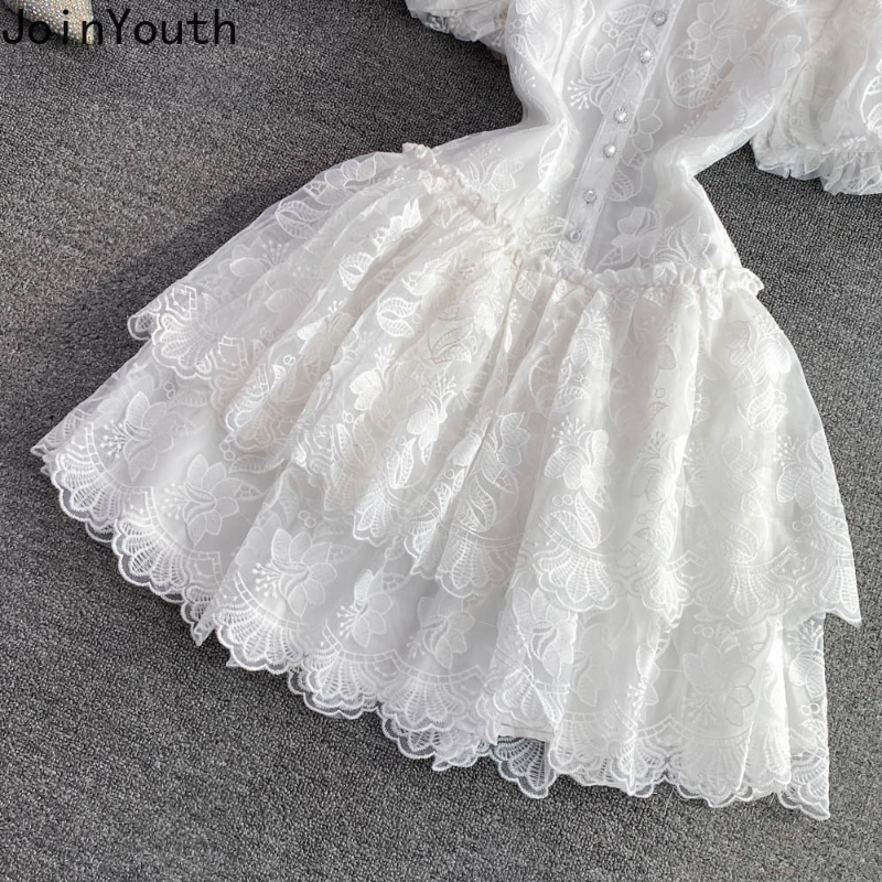 Robe d'été en dentelle blanche pour femmes, tunique de tempérament, manches bouffantes, broderie, à la mode, 2025