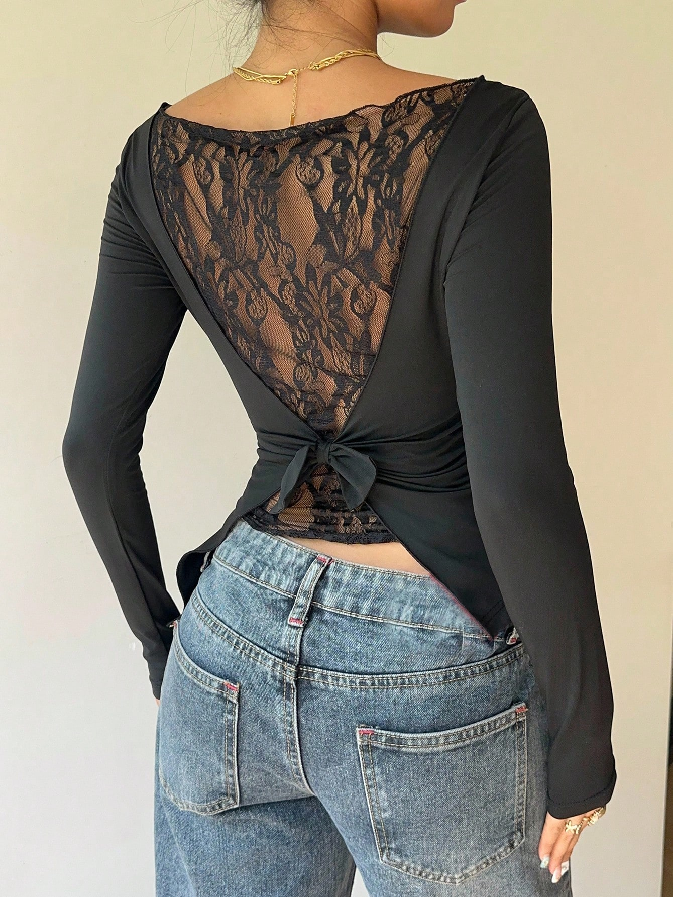 Femmes élégant dentelle Patchwork arc décorer à manches longues T-Shirt décontracté asymétrie ourlet coupe ajustée col bateau plissé hauts 2026