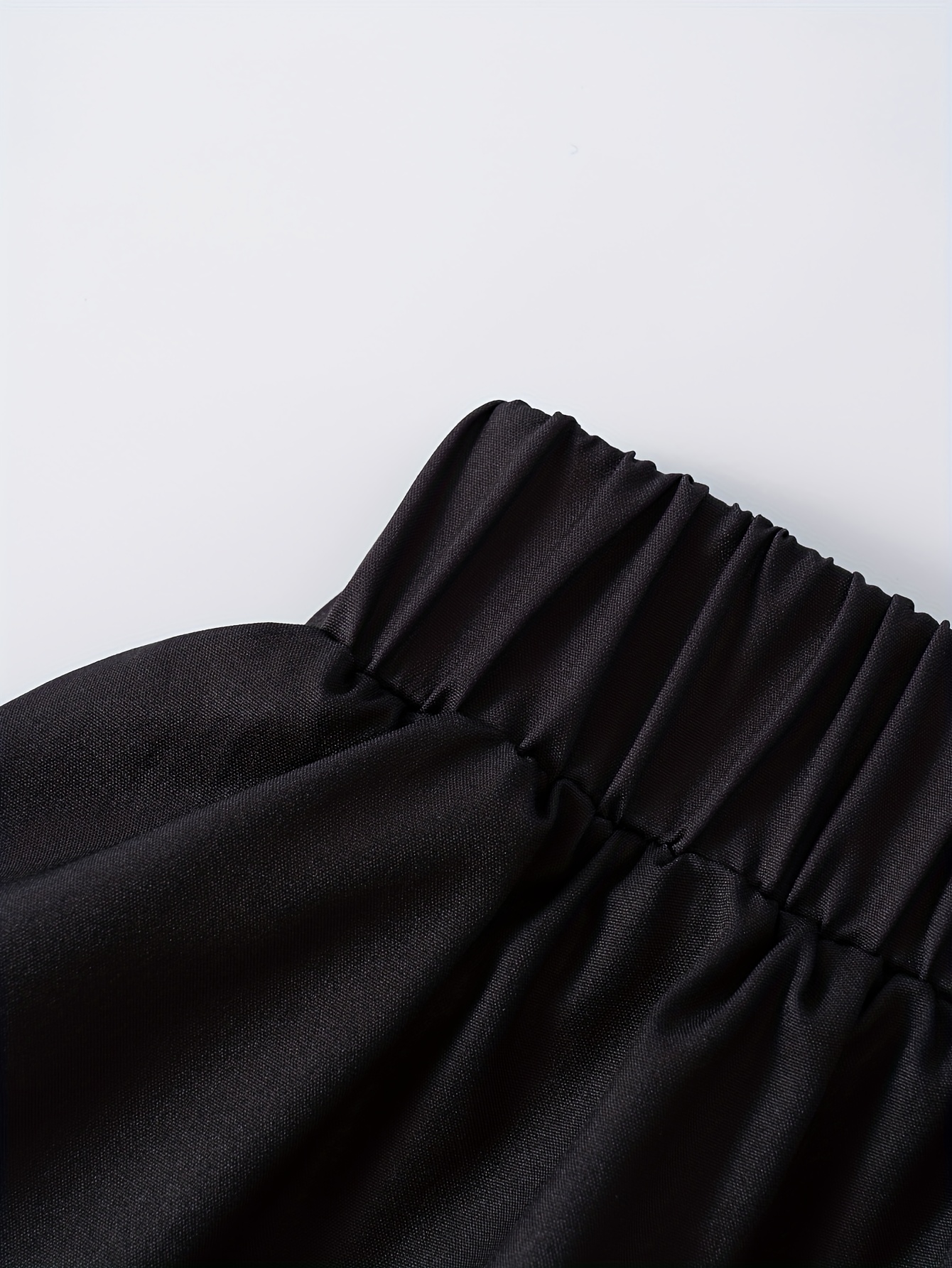 Jupe midi plissée taille haute élastique unie pour femme, idéale pour l'été et le bureau, style décontracté et tendance