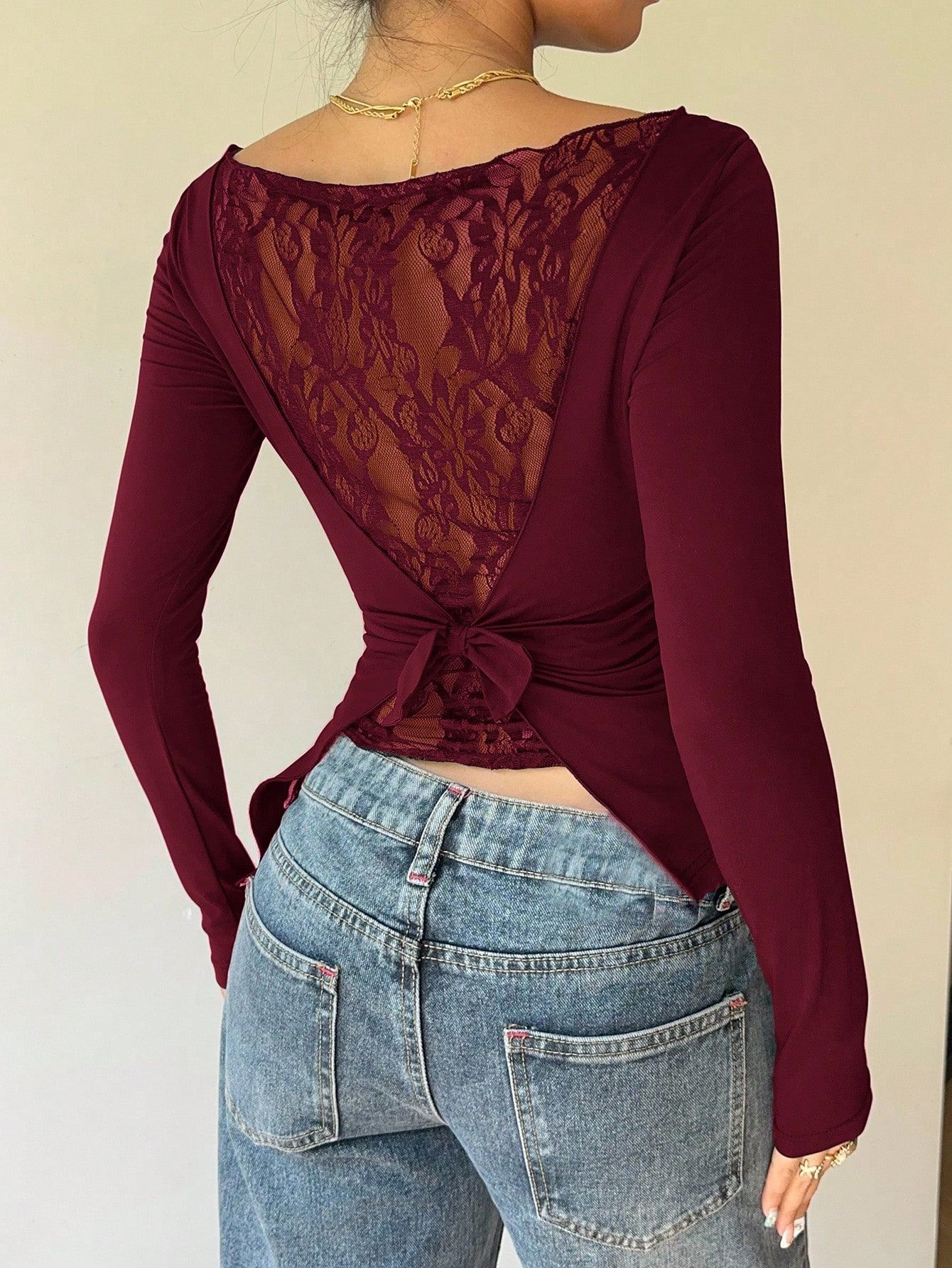 Femmes élégant dentelle Patchwork arc décorer à manches longues T-Shirt décontracté asymétrie ourlet coupe ajustée col bateau plissé hauts 2026