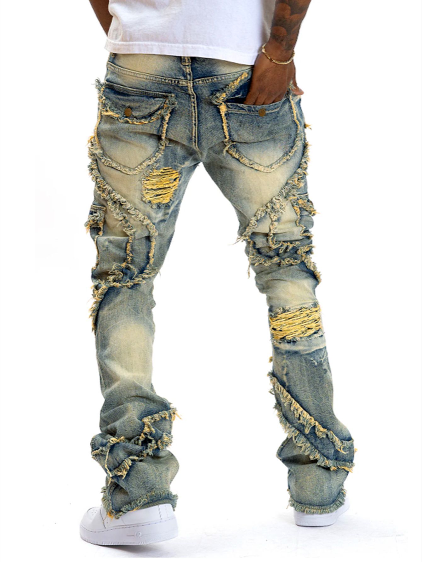 2025 Nouveaux jeans décontractés pour hommes européens et américains, mode punk de rue, rétro, trou déchiré, jeans élastiques à pampilles légèrement évasées