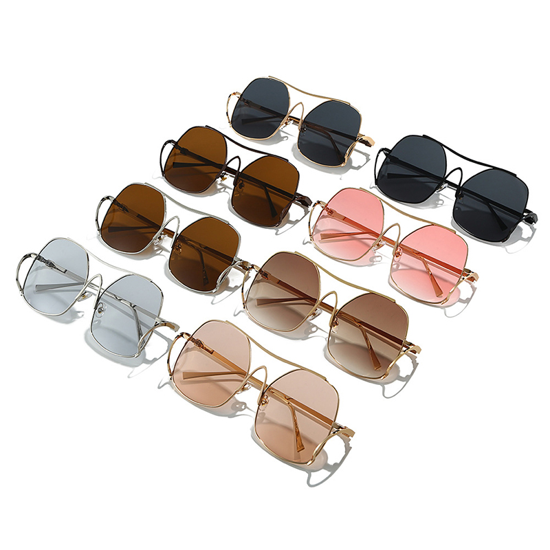 Lunettes de soleil pilote à double pont uniques pour femmes, monture en métal irrégulière, lunettes de soleil ovales creuses, design de luxe, lunettes d'extérieur