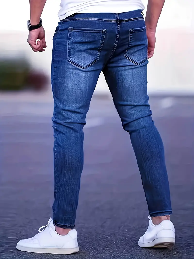 Jeans en denim stretch slim pour homme avec détails déchirés et surpiqûres contrastées, pantalon décontracté streetwear tendance pour le quotidien