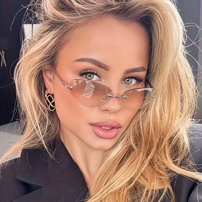 Lunettes de soleil œil de chat tendance sans monture, ovales, pour hommes et femmes, protection UV400, pour la conduite, style Y2K, verres dégradés sans cadre