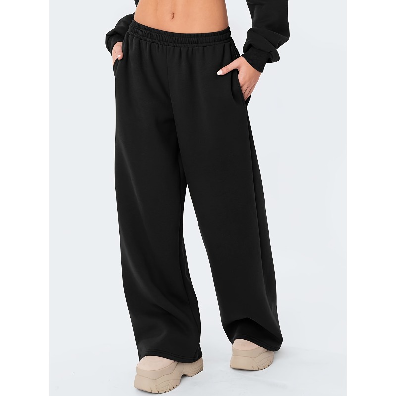 Les pantalons décontractés à jambes larges pour femmes sont chauds et confortables. Les pantalons décontractés d'hiver de couleur unie sont coupe ample