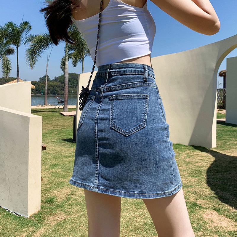 Jupe courte en denim pour femme, taille haute, demi-corps fendu, hanche enveloppée rétro, pantalon trapèze, été, nouveau