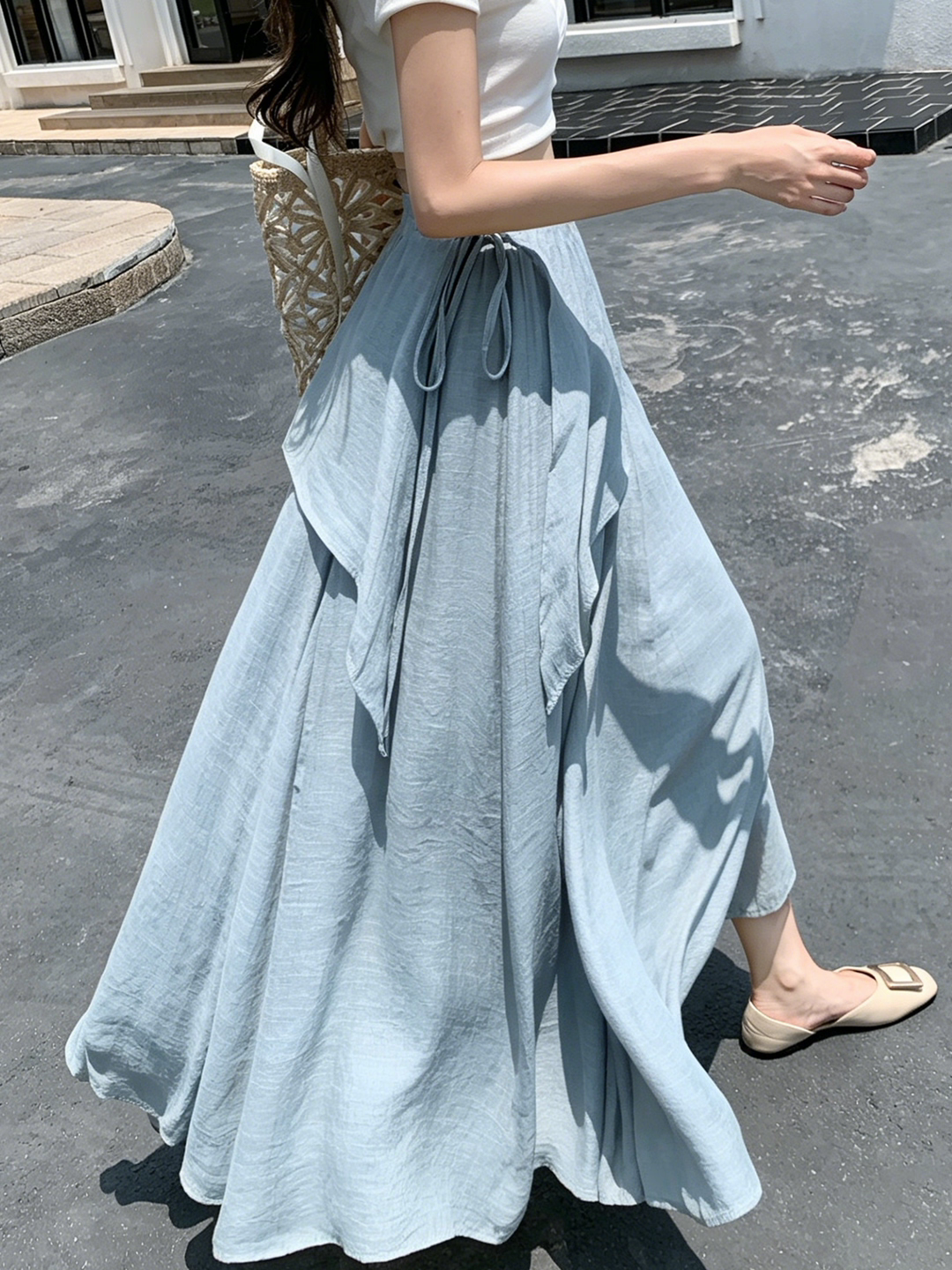 Nouvelle jupe longue évasée taille haute à nouer pour femme, style bohème fluide, collection été 2026, idéale pour couvrir les hanches