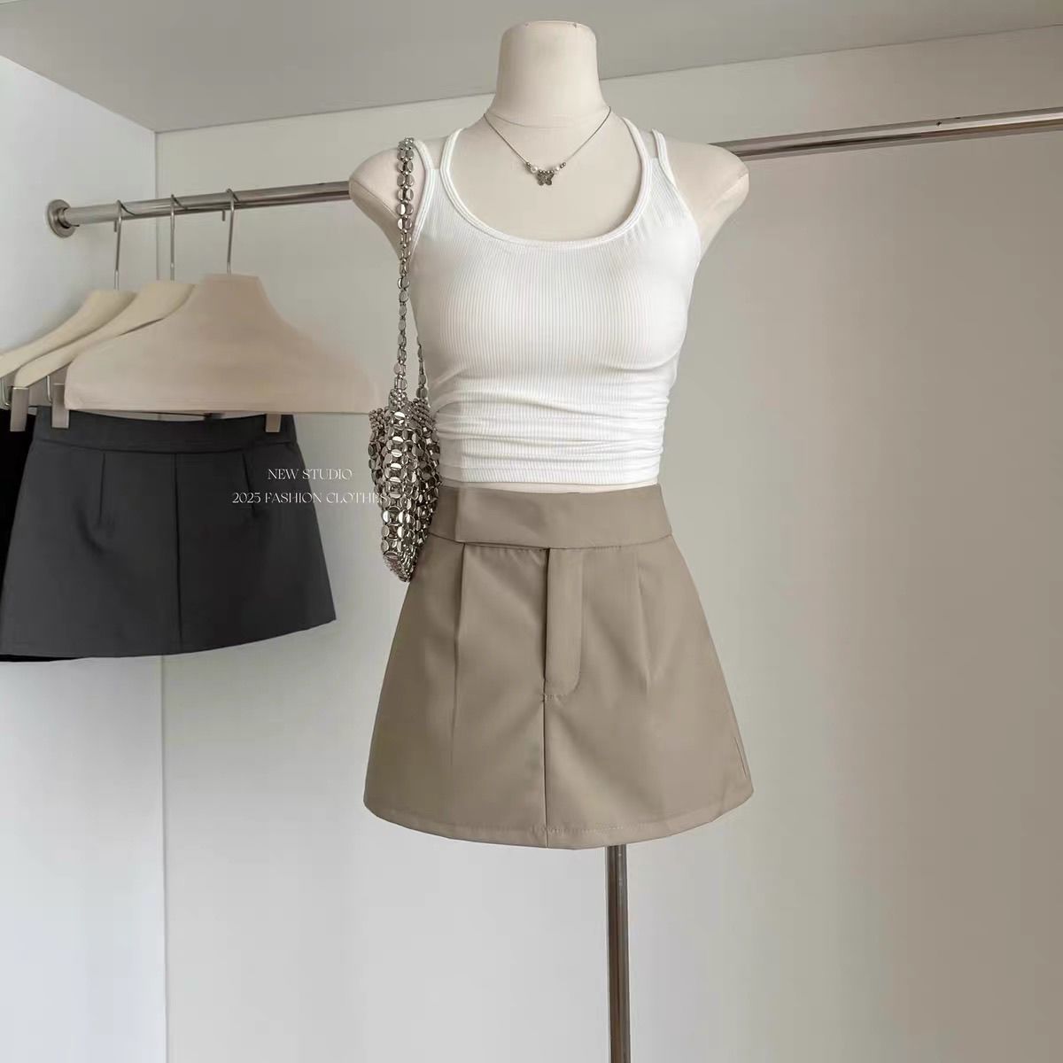 Jupe kaki pour femmes, nouvelle jupe noire taille haute aux hanches, printemps 2026