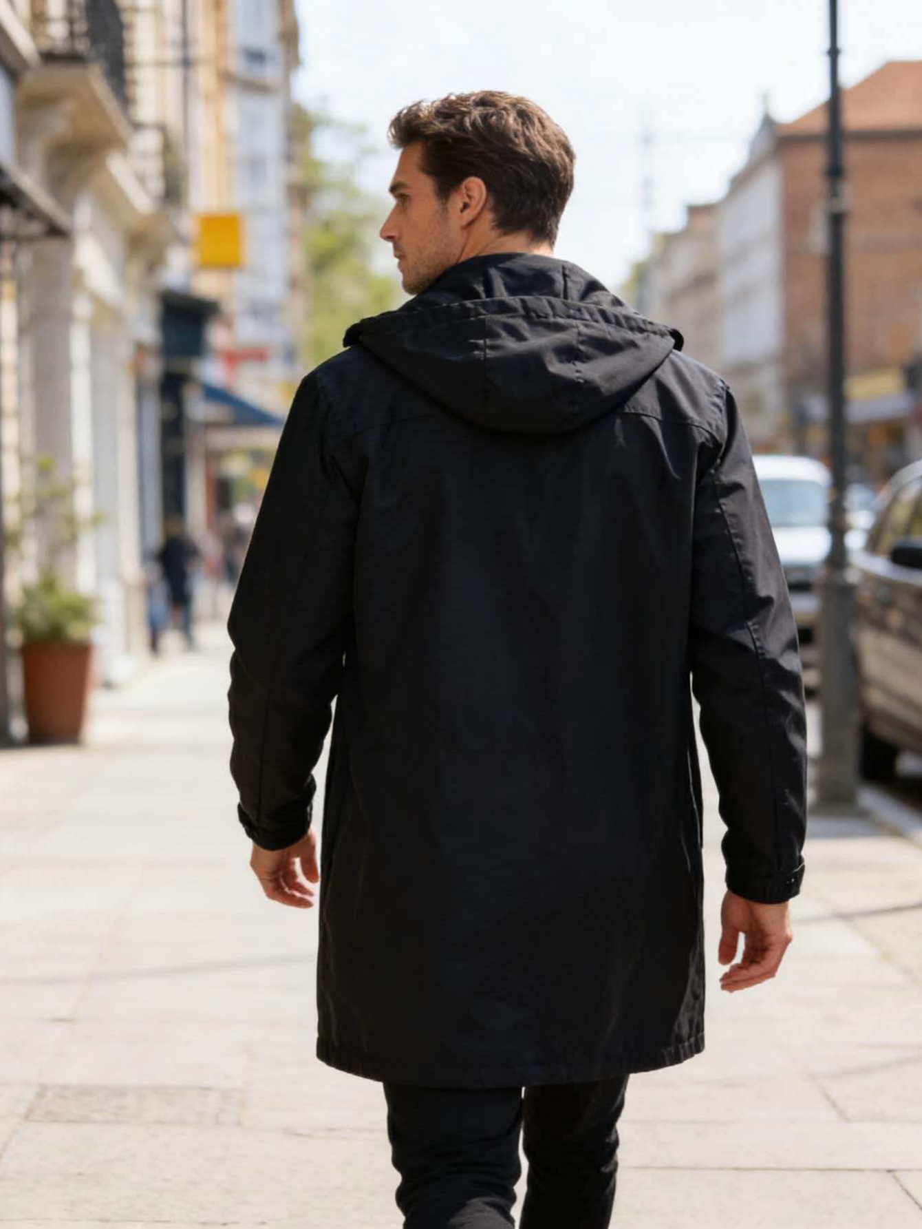 Parka longue à capuche pour homme noir, coupe-vent mi-longue décontractée urbaine avec capuche ajustable et poches zippées