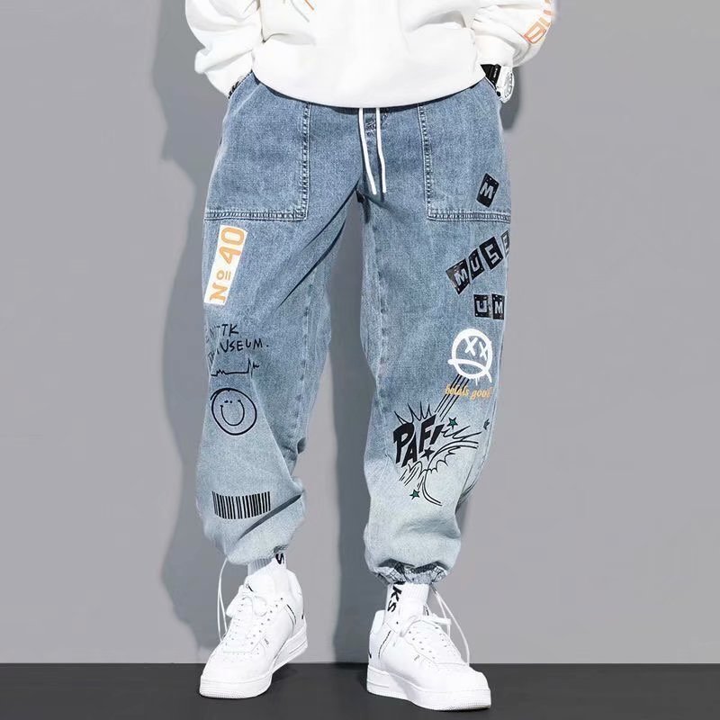 Vêtements coréens hommes lettre imprimé jean taille haute Baggy jean dessin animé Graffiti Hip-Hop pantalon jean bleu