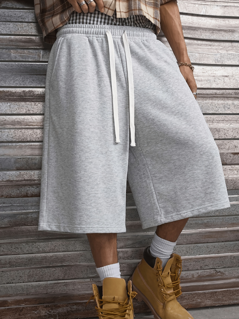 Mode masculine, design sportif et décontracté, choix idéal pour les exercices d'été et les activités de plein air, tenue quotidienne et streetwear