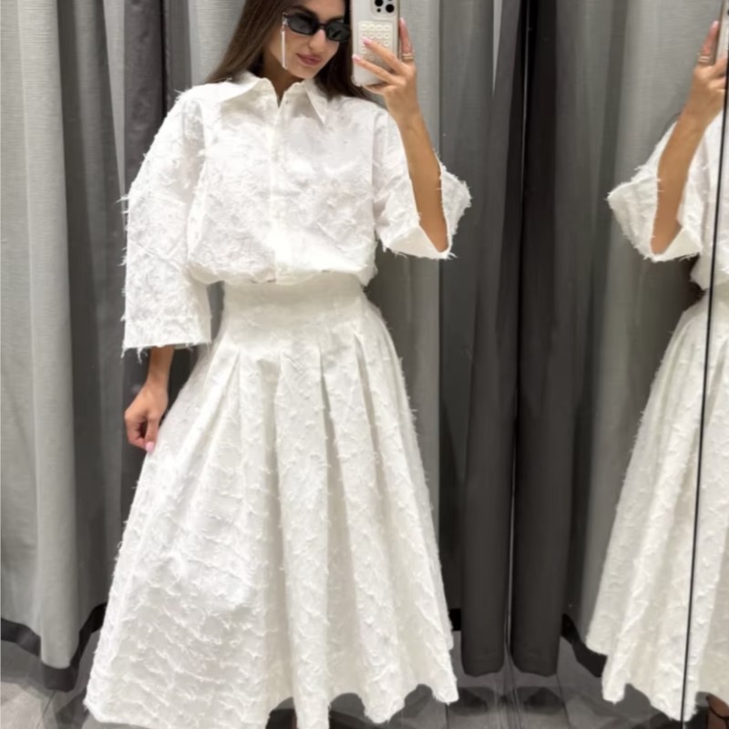 Femmes Design de mode gland Blouse jupe costume élégant blanc revers à manches longues chemise ample a-ligne plissée jupe Midi ensemble assorti