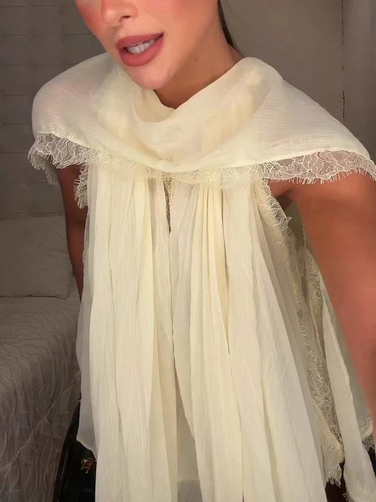 Chemisier en mousseline de soie à patchwork de dentelle pour femme, coupe ample, sans manches, plissé, chic, style châle, T-shirt polyvalent pour les vacances d'été 2026