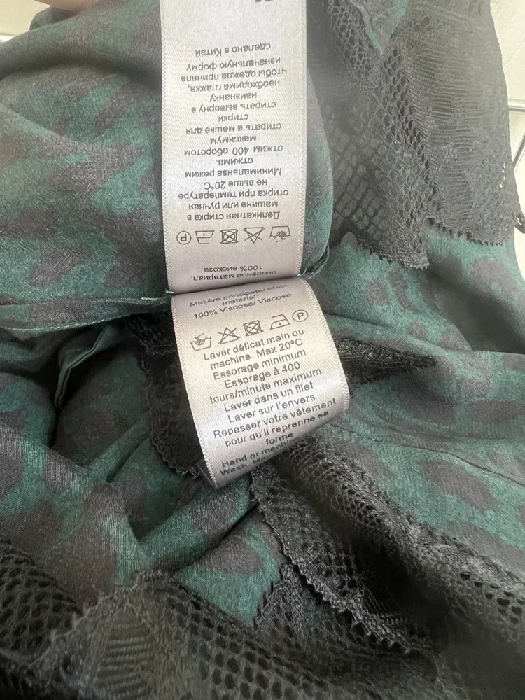 Femmes dentelle épissure mi-mollet Jupe léopard imprimé Viscose classique avant court et arrière longue conception taille élastique dame Jupe