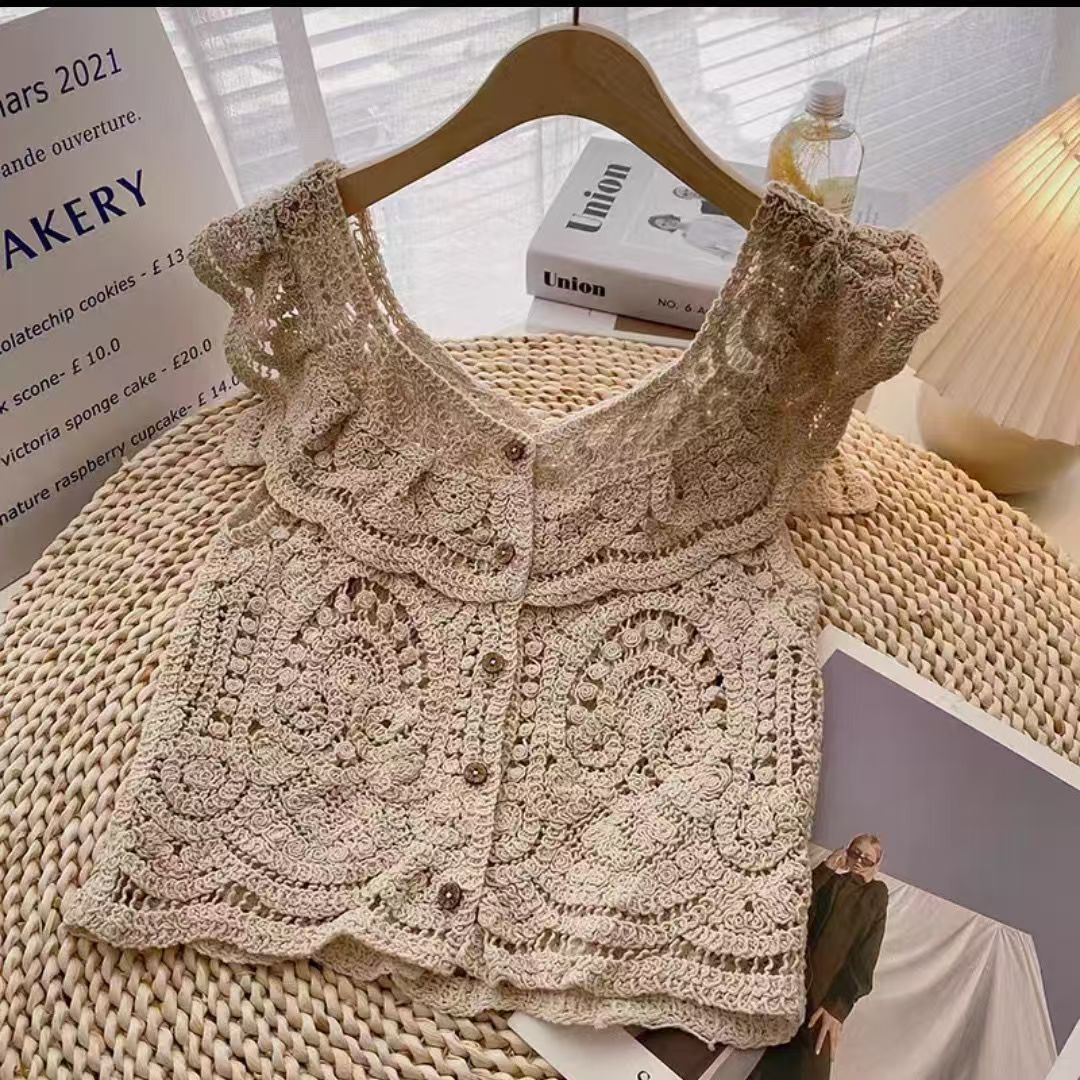 Mode coréenne sans manches tricoté hauts simple boutonnage décontracté femmes Blouse été crochet fleur chemise creuse