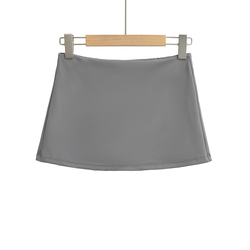 Mini-jupe taille basse pour femme avec détail coupe courte, coupe ajustée, mini-jupe-short
