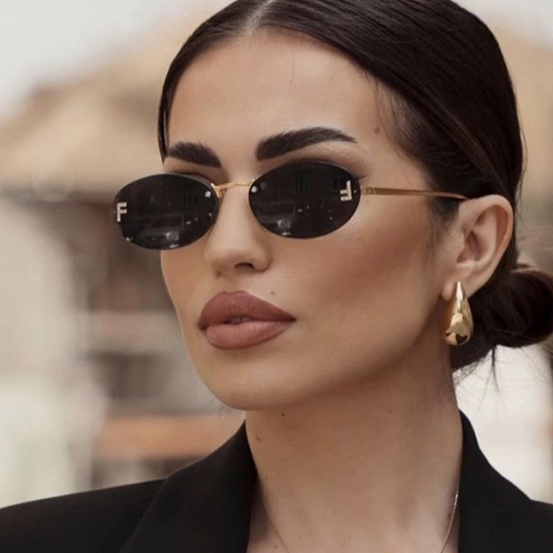 Lunettes de soleil ovales sans monture tendance pour femmes, petite taille, monture en métal, protection UV400, pour les loisirs en plein air et les vacances