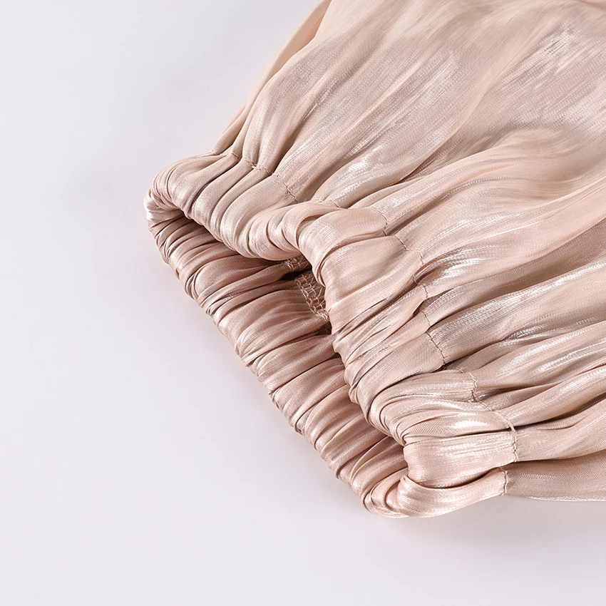 Pantalon ballon plissé rose élégant en crêpe pour femme, style chic urbain, taille haute, vintage, automne