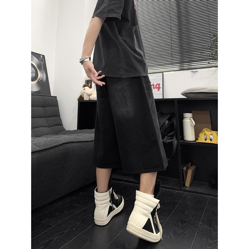 Shorts en jean déchirés et usés unisexe style streetwear américain décontracté coupe droite ample sept-quarts pour l'été