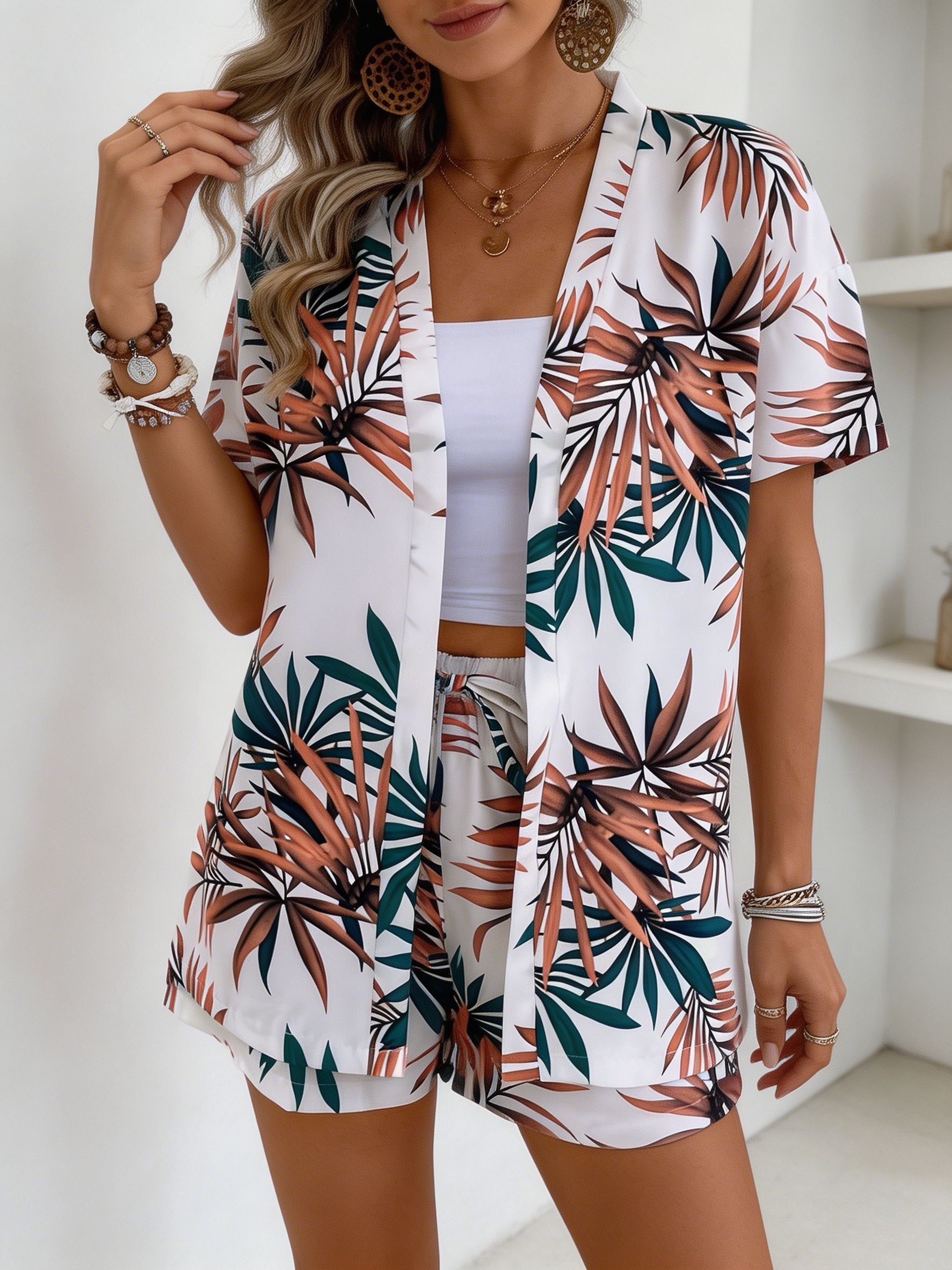 Nouvel ensemble deux pièces floral été 2026, chemisier tissé à manches courtes et short, tenue de plage pour femme