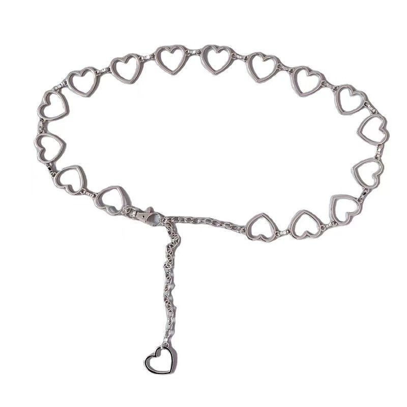 Ceinture chaîne cœur tendance pour femme, ceinture ajustable argentée à taille haute, longueur 110 cm, modèle de créateur avec chaîne à pompons