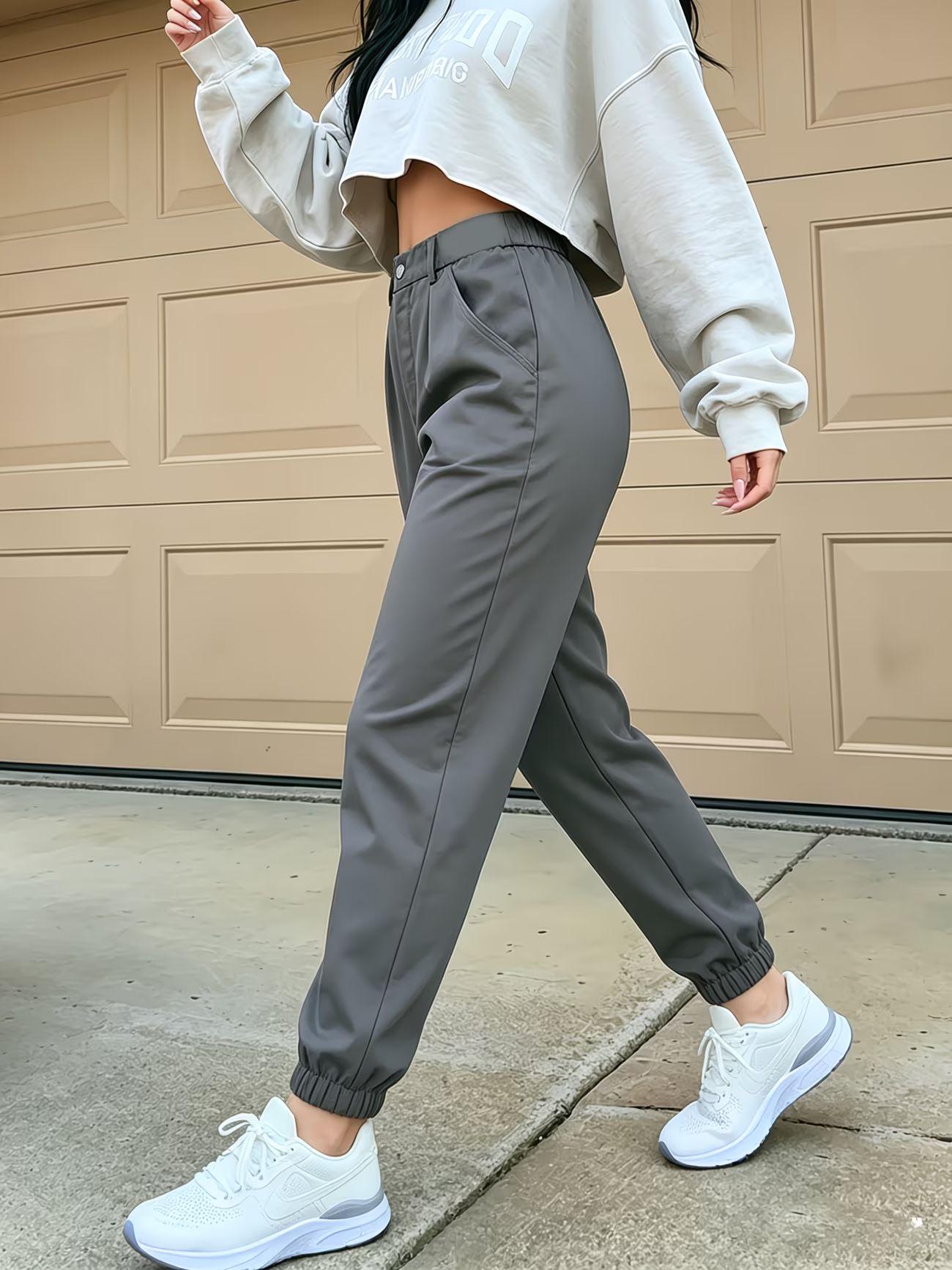 Pantalon cargo décontracté pour femmes, tendance streetwear, avec poches et taille élastique, idéal pour les trajets quotidiens et le quotidien
