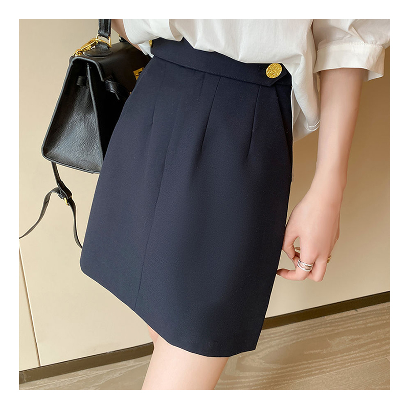 Petite jupe trapèze à la mode avec fesses enveloppées, demi-jupes grises haut de gamme, début d'automne, nouveau