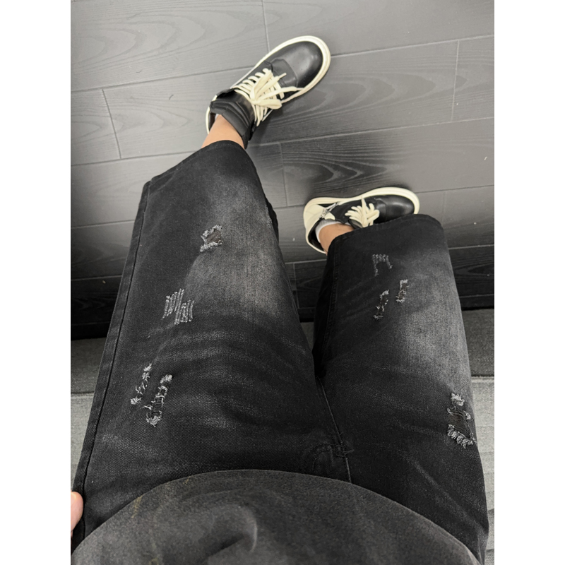 Shorts en jean déchirés et usés unisexe style streetwear américain décontracté coupe droite ample sept-quarts pour l'été