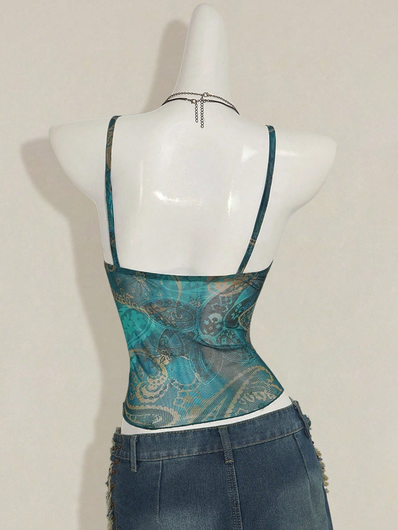 Haut court asymétrique en maille transparente à col en V sexy pour femme, avec ourlet plissé et dos nu, coupe ajustée décontractée, motif cachemire, été 2026