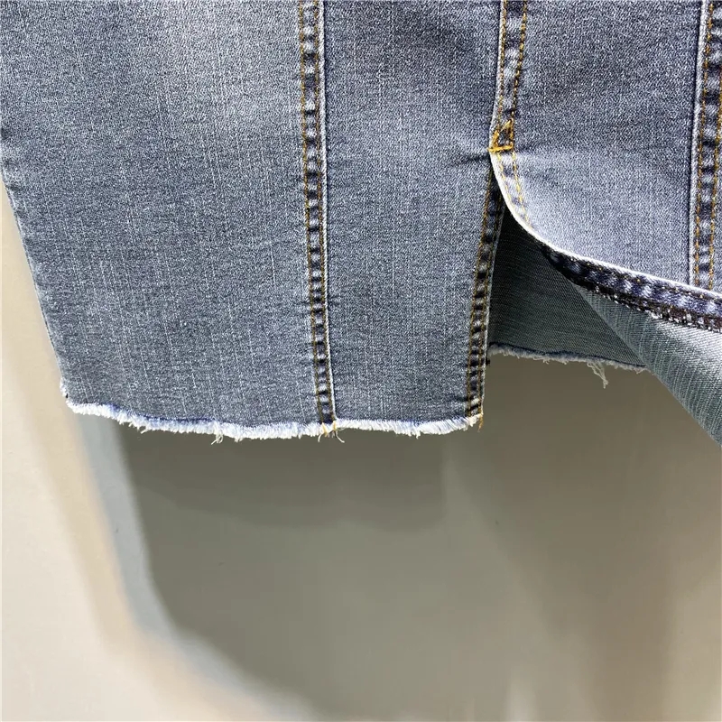 Jupe en jean taille haute élastique mi-longue moulante pour femme, nouvelle mode printemps-été 2026, avec fente et polyvalente