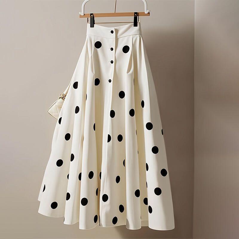 Nouvelle collection Printemps-Été : Jupe parapluie élégante style fée française, jupe polyvalente à taille haute à pois, haut de gamme et tendance pour femme.
