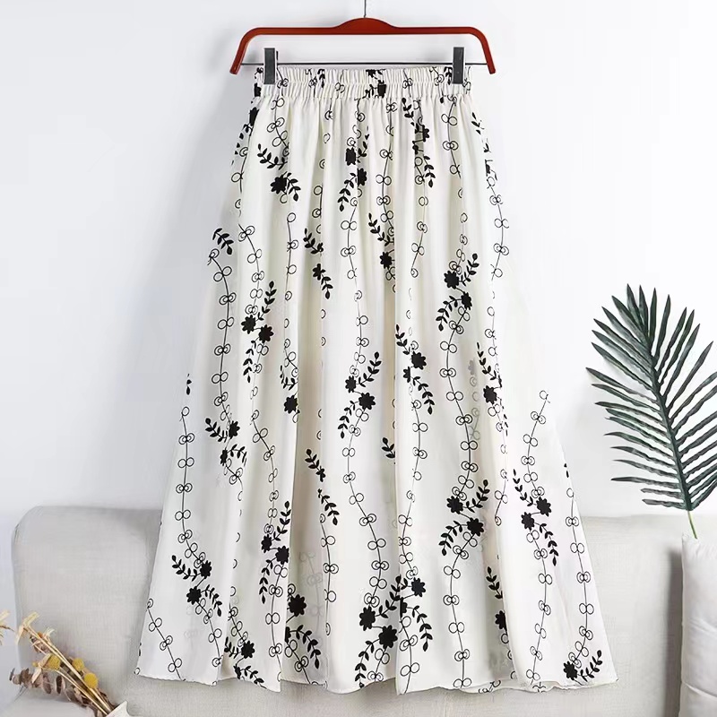 Jupe d'été pour femme en mousseline, style vintage, imprimé floral, taille haute élastique, décontractée, mi-longue, coupe trapèze, pour la plage