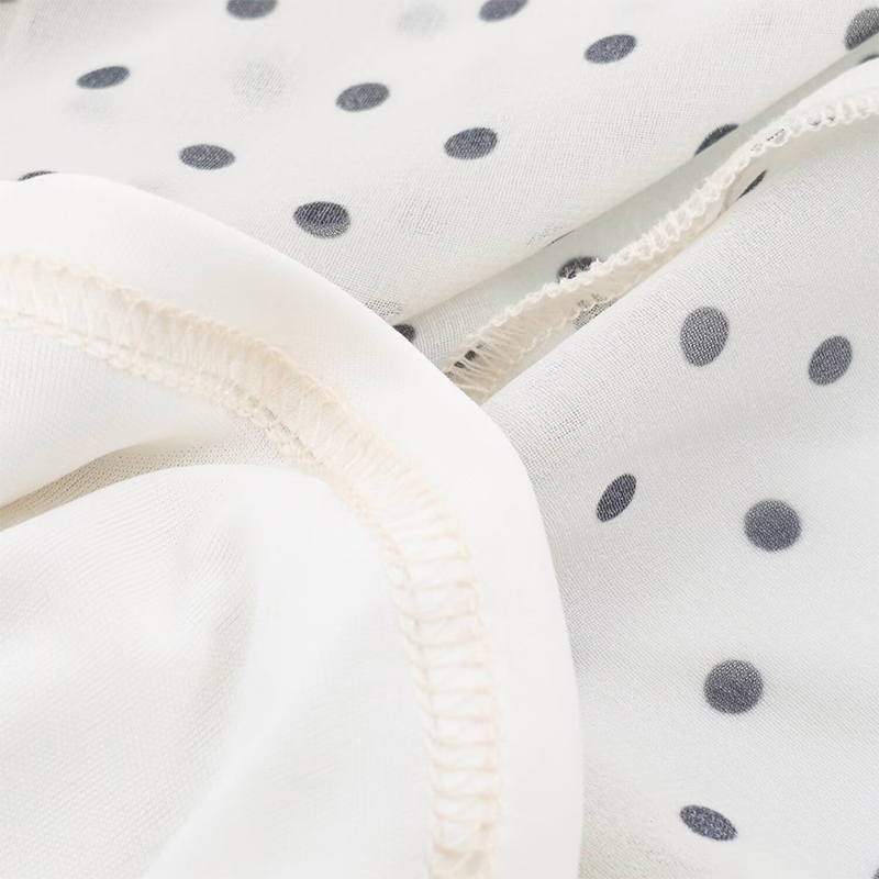 YENKYE Robe élégante pour femmes, patchwork, à pois, à volants, avec ceinture, col rond, sans manches, longueur midi