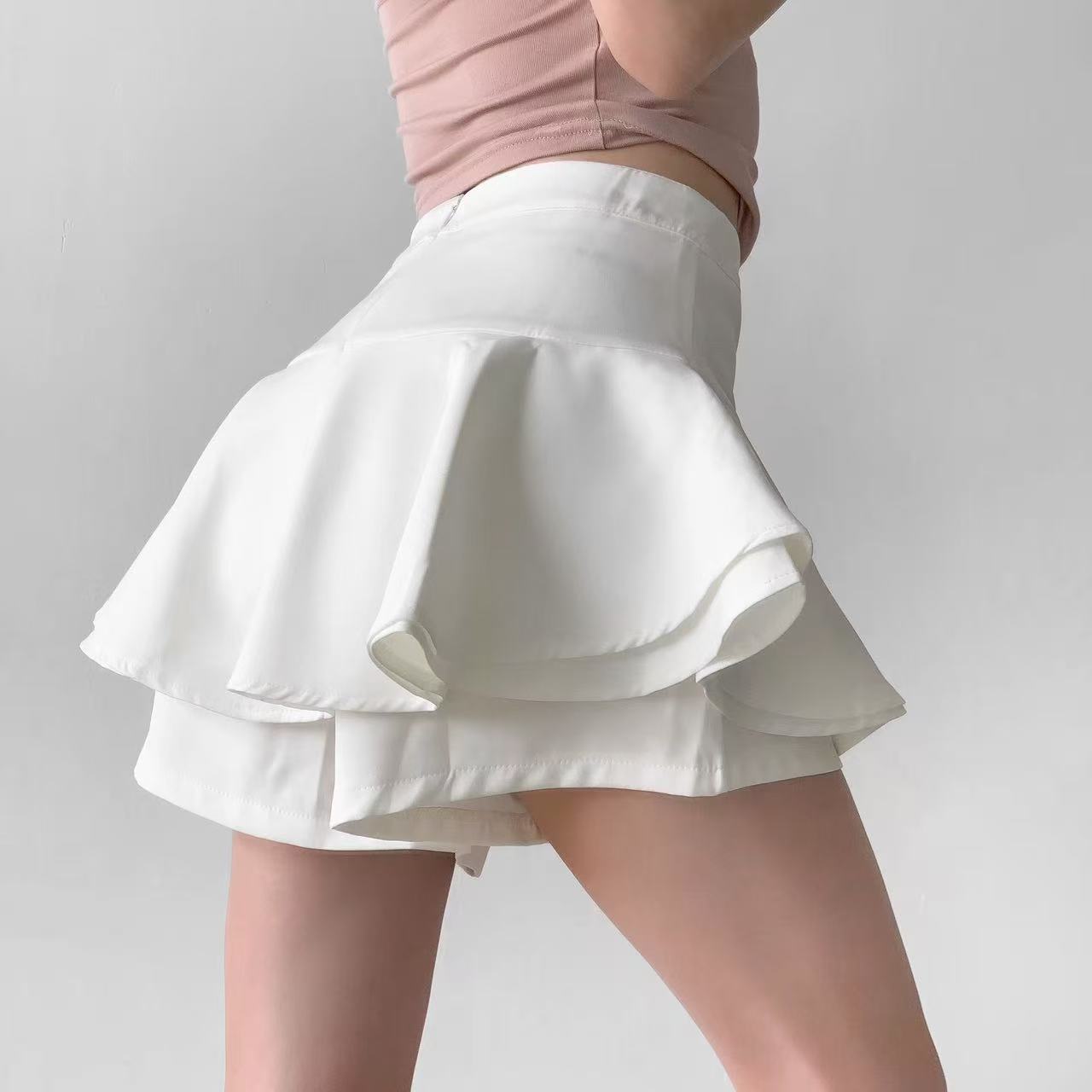 Jupe de bal asymétrique à volants pour femme, mini-jupe coréenne taille haute élégante et sexy, idéale pour l'été, style A-line, couleur unie, passe-partout